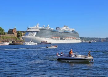 Cruise ship in Oslo harbour beside Akershus Fortress