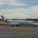 American Eagle Bombardier CRJ900 N572NN operated by PSA Airlines taxiing at Richmond International Airport
