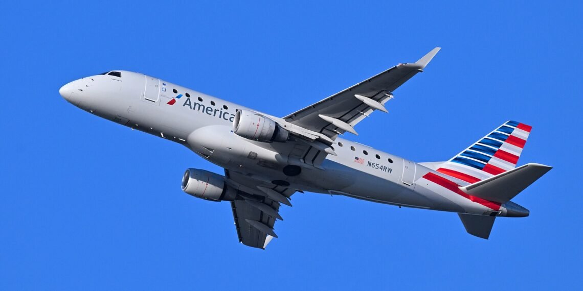 American Eagle Embraer 170 N654RW departing Boston July 2026