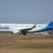 Horizon Air Embraer 175 N633QX taxiing at Calgary International Airport