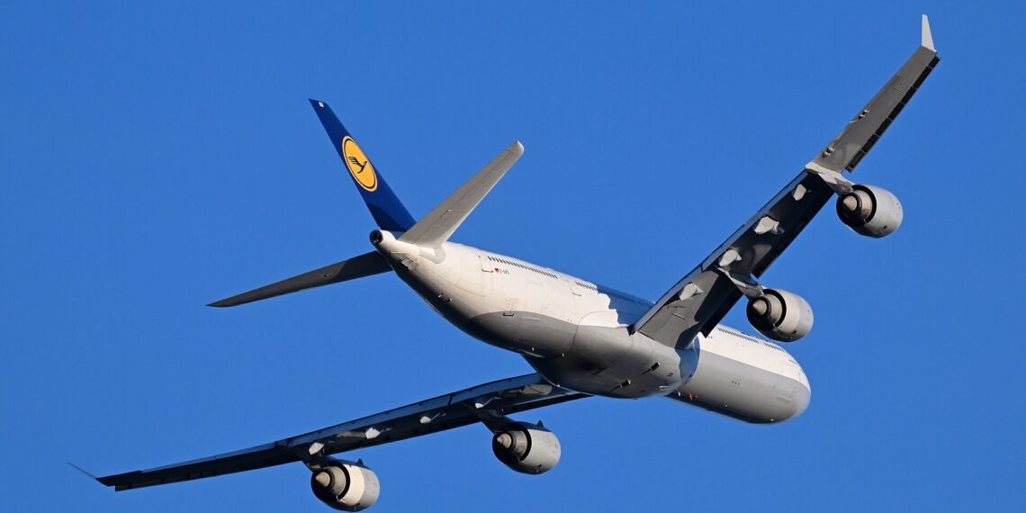 Lufthansa Airbus A340-600 D-AIHU climbing out of Boston