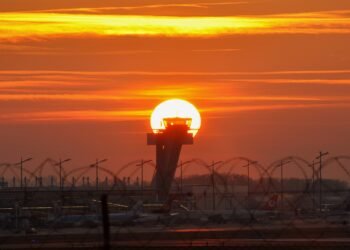 Control tower at Nuremberg Airport in Germany at sunset