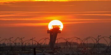 Control tower at Nuremberg Airport in Germany at sunset