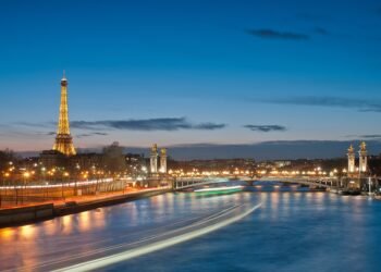 Eiffel Tower and Pont Alexandre III over the Seine in Paris at night