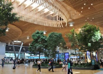 The renovated main terminal at Portland International Airport (PDX) with its large wooden roof