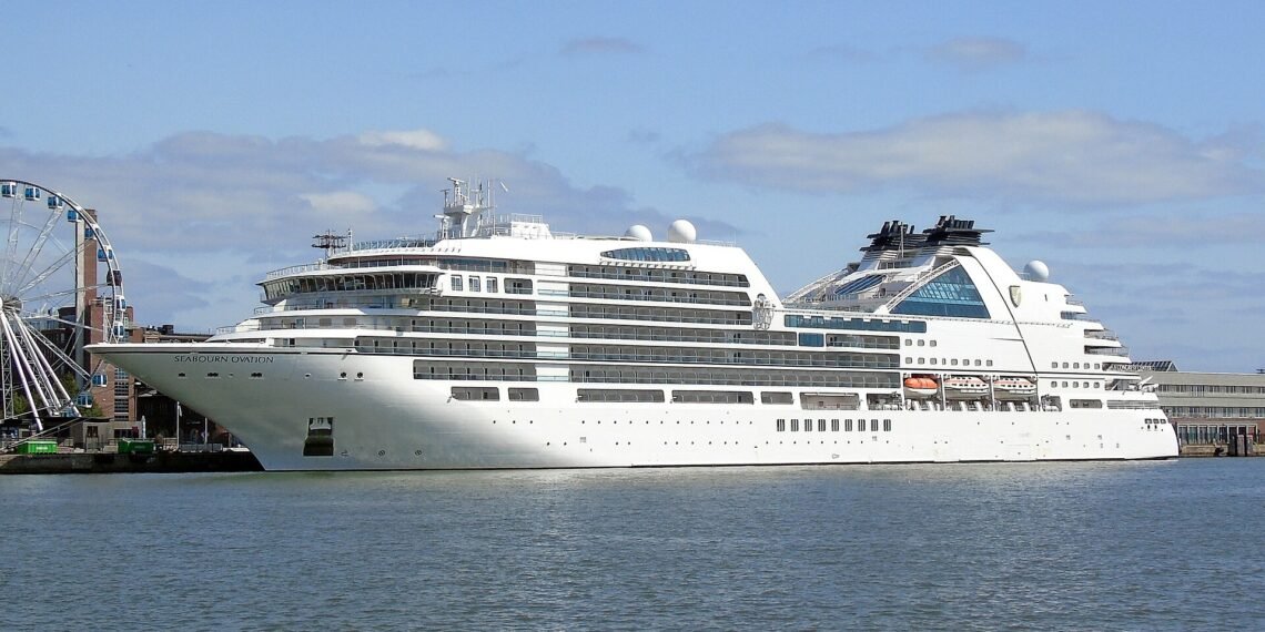Seabourn Ovation cruise ship alongside a pier