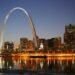 St. Louis skyline at night on the Mississippi River, with the Gateway Arch and the Old Courthouse
