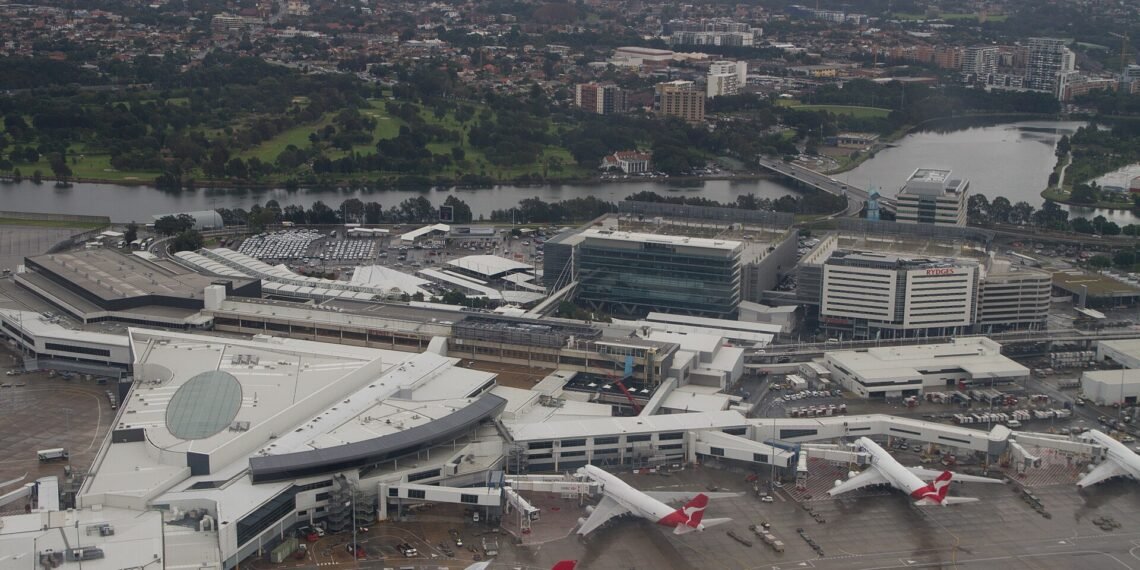 Aerial view of the international terminal at Sydney Kingsford Smith Airport with aircraft at the gates