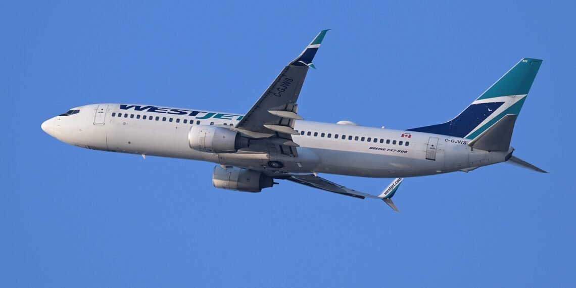 WestJet Boeing 737-800 C-GJWS departing Boston June 2025